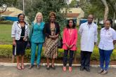 Chair, Prof. Obondo with Visiting Lecturer Sara Deland and staff